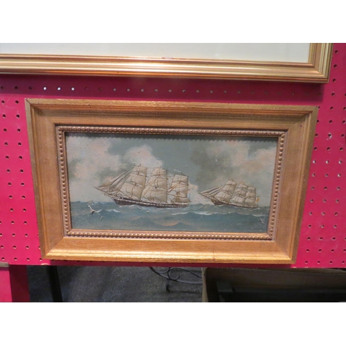 1169 - A naive oil on board of sailing vessels in choppy seas, gilt framed, 13.5cm x 17.5cm image size