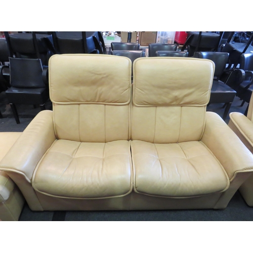 1208 - An Ekornes of Norway cream leather sofa suite consisting of armchair with drinks table and foot stoo... 