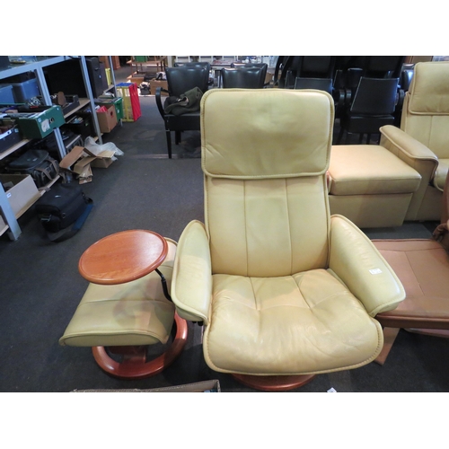 1208 - An Ekornes of Norway cream leather sofa suite consisting of armchair with drinks table and foot stoo... 