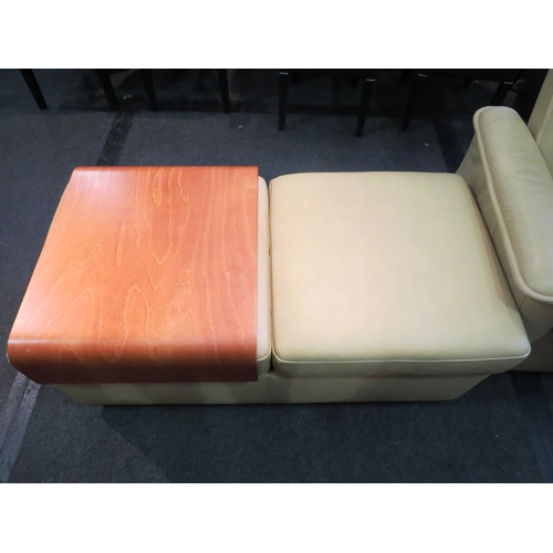 1208 - An Ekornes of Norway cream leather sofa suite consisting of armchair with drinks table and foot stoo... 