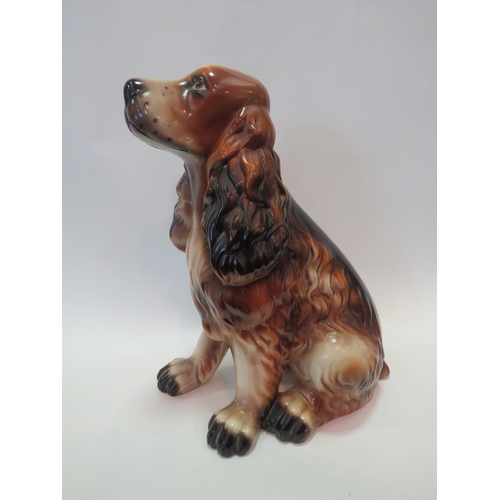 1236 - A ceramic model of a spaniel, 41cm tall