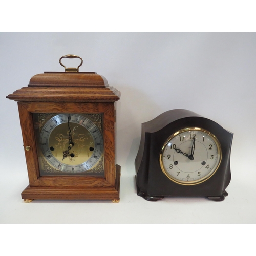 1259 - A Smiths 8-day striking mantel clock in Bakelite case with original guarantee dated 1957 and instruc... 