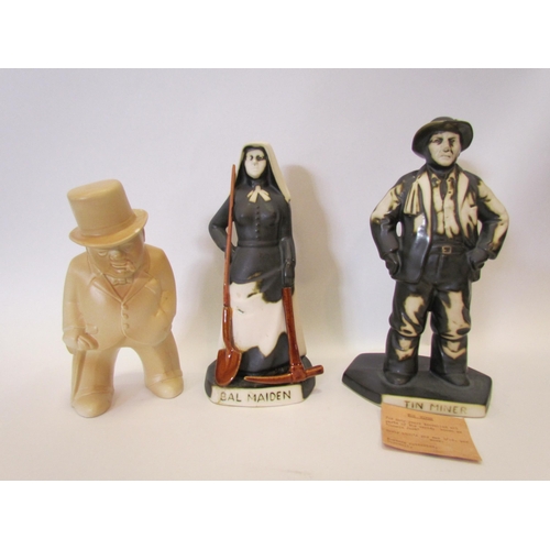 1318 - A Fosters Studio pottery tin miner and a maiden together with a Bovey Pottery Churchill 