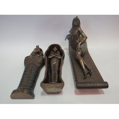 1332 - A 'Veronese' Egyptian style bronzed resin sarcophagus, 30cm long, together with a lady on chaise lon... 