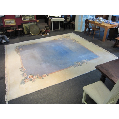 1541 - A large Chinese rug, blue and cream ground with foliate design and tasselled ends, 360cm x 335cm  (E... 