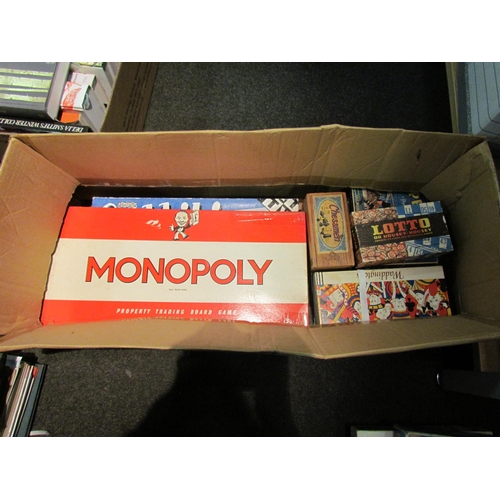 1212 - A box of vintage games; Monopoly, Thunderbirds puzzle, etc