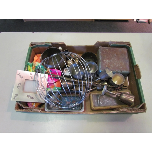 1306 - A box of metalware including enamel dishes, cutlery, goblets, etc