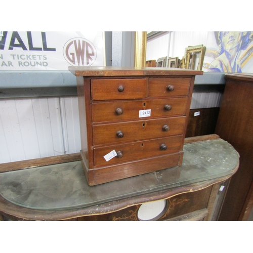 2413 - A Victorian mahogany apprentice chest of drawers