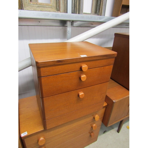 2422 - A pair of Stag 1970's teak three drawer bedsides