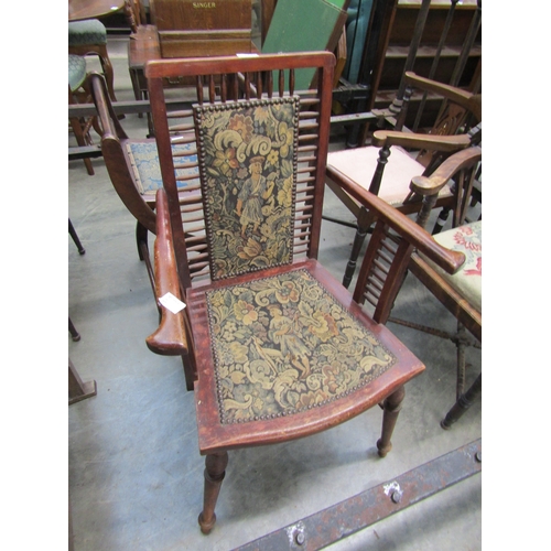 2448 - An Arts and Crafts spindle back elbow chair