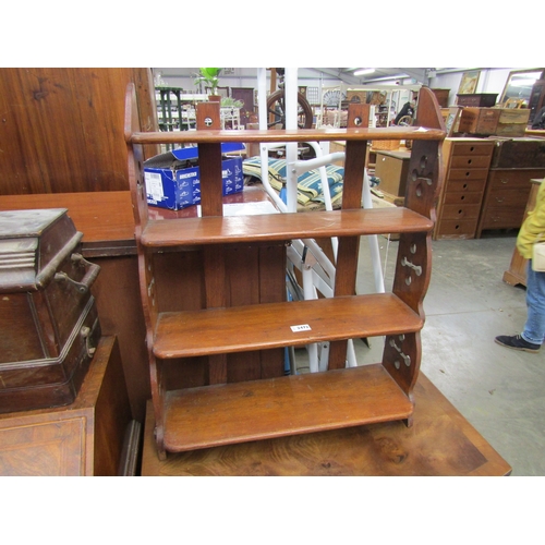 2472 - An Edwardian oak three tier wall shelf        (E) £15-20