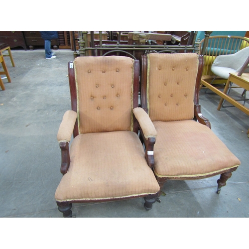 2475 - An early Victorian mahogany armchair, shaped frieze under arms, for reupholstery, together with anot... 