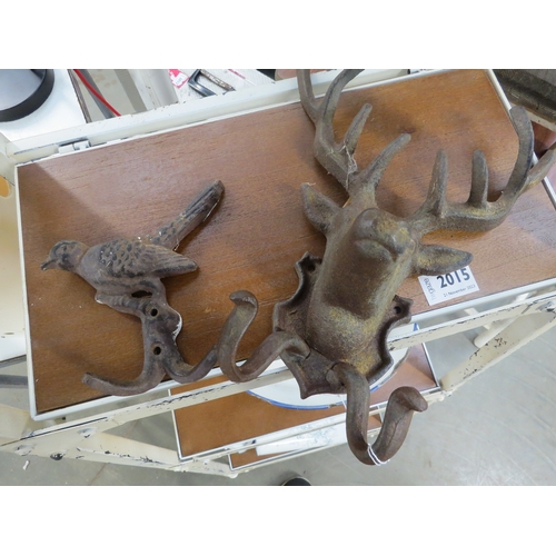 2016 - Two cast iron hooks in the form of a stag and a bird