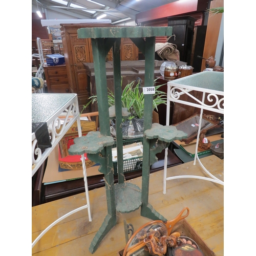 2058 - A green painted five tier plant stand