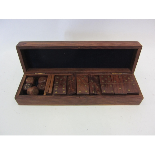 1363 - A hardwood brass inlaid domino/games box containing dominoes and dice