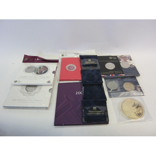 1379 - A collection of Royal Mint presentation pack coins of Elizabeth II, commemorative issues in cupro ni... 