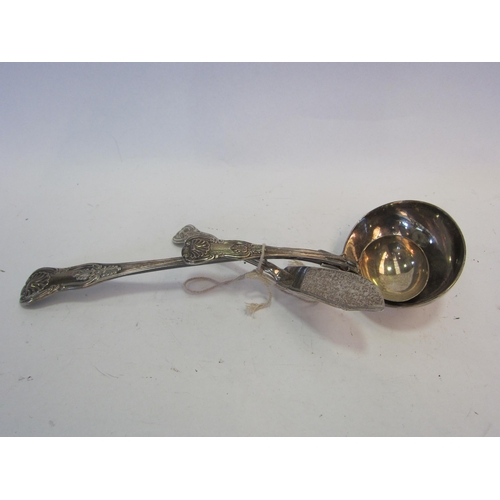 1382 - A Georgian silver soup ladle together with sauce ladle and a fish knife, shell relief terminals, Lon... 