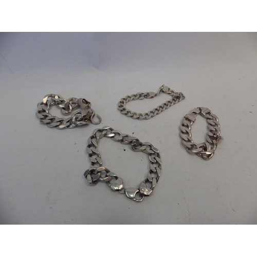 1410 - Four chunky bracelets, three marked 925. 200g