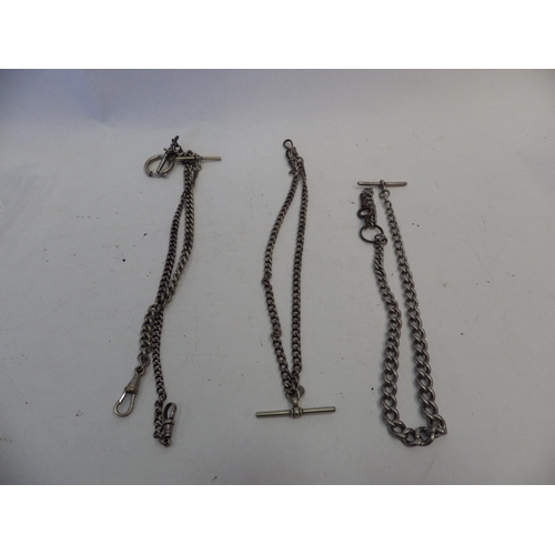 1411 - A bag containing four watch chains including silver