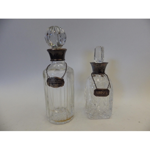 1449 - Two whisky decanters, both with silver collars and labels