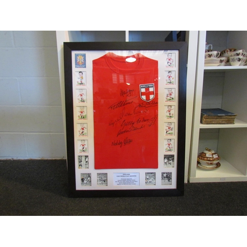 1461 - A replica 1966 England shirt bearing signatures, framed and glazed, 87cm x 67cm total