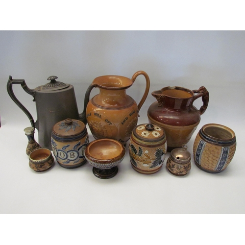 1464 - Nine pieces of Doulton stoneware including jugs and jars and a pewter teapot (10)