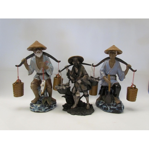 1476 - A pair of Japanese pottery water carrier figures and a Regency Fine Arts example (3)  (E)  £15-25