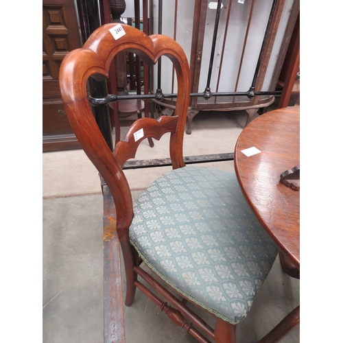 2441 - A pair of Victorian walnut shaped balloon back bedroom chairs