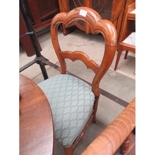 2441 - A pair of Victorian walnut shaped balloon back bedroom chairs