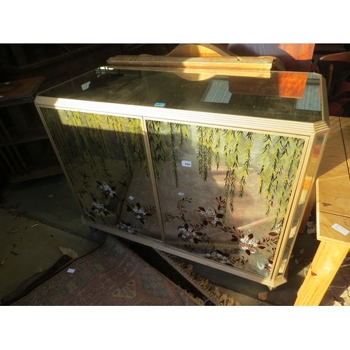 2466 - A mirrored and silvered mini bar with floral design to front, 96cm tall x 128cm wide x 60cm deep    ... 