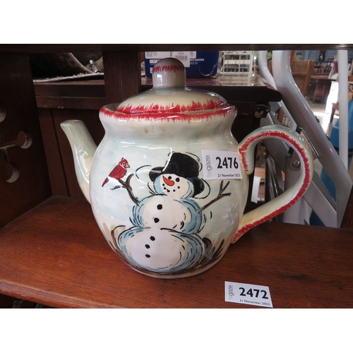 2476 - An Italian painted ceramic candle stick and a tea pot          (R) £10