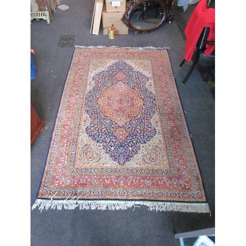 1528 - A Keshan foliate design carpet, multiple borders and tasselled ends, 225cm x 147cm