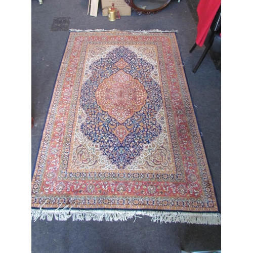 1528 - A Keshan foliate design carpet, multiple borders and tasselled ends, 225cm x 147cm