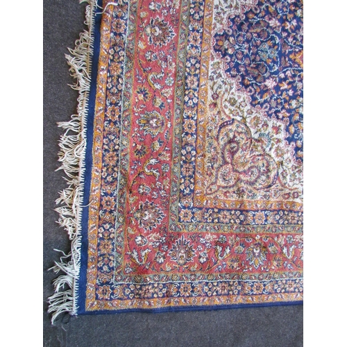 1528 - A Keshan foliate design carpet, multiple borders and tasselled ends, 225cm x 147cm