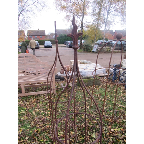 9067 - A pair of steel rust finish spike-top obelisks