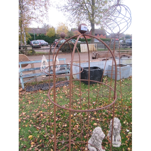 9081 - A pair of steel rust finish ball-top obelisks