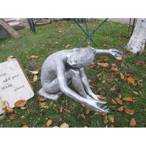 9100 - An aluminium sculpture of a young female with glass top