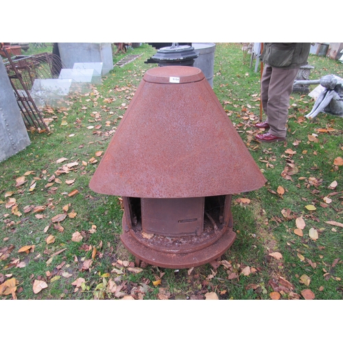 9104 - An iron arch front stove with hood