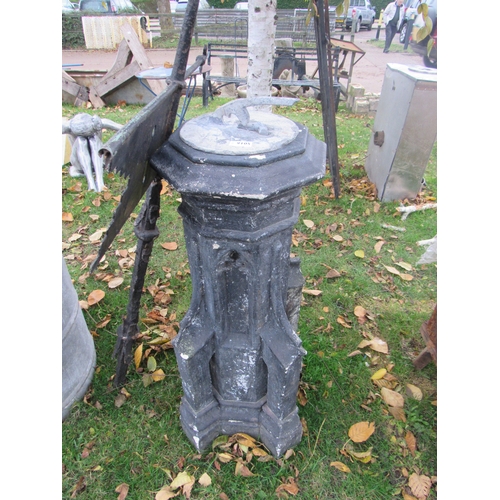 9105 - A Portland stone church finial with lead sundial top      (R) £400