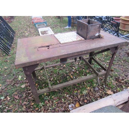 9153 - A cast iron workshop bench, 24