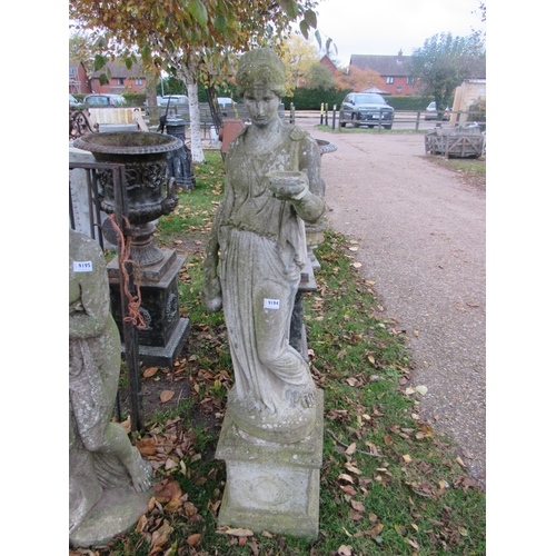 9194 - A composition statue of a maiden holding a ewer on shaped plinth, 55