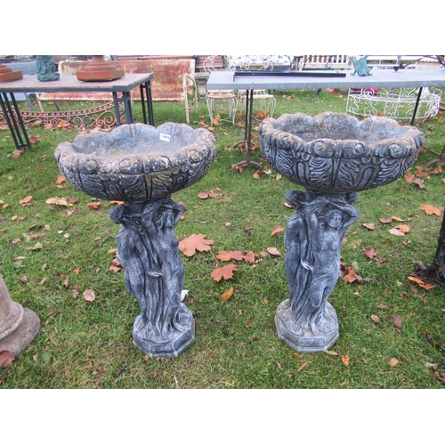 9475 - A pair of composition shallow planters standing on three graces bases, 32