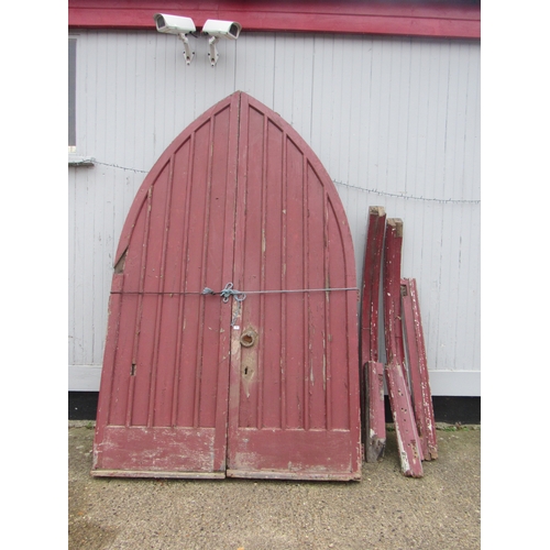 9497 - A large pair of 19th Century pine arch top doors with frame, 72