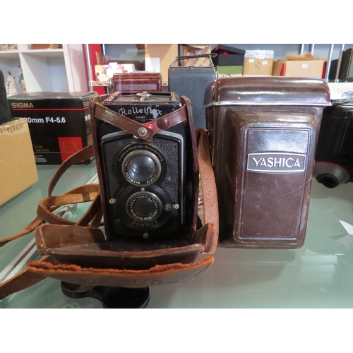 5039 - A vintage Rolleiflex 6x6 TLR camera & A Yashica-Mat 6x6 TLR camera