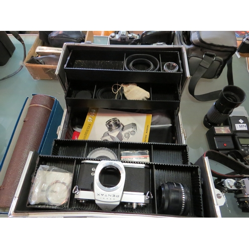 5075 - A metal camera box with a quantity of pentax camera body's and lenes