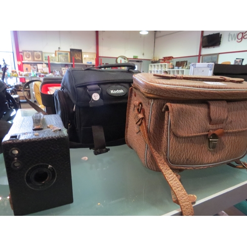 5091 - A brownie camera, case and accessories with a Kodak camera bag   (E) £10-20