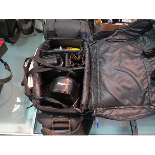 5096 - A camera bag of Nikon accessories and cameras including a Nikon F-801