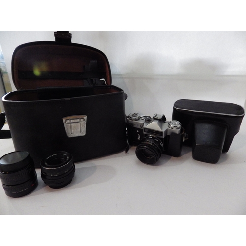 5027 - A zenith E camera with various lenses and a variable auto-tub and bag