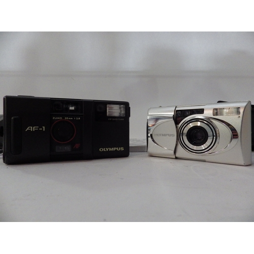 5037 - A Olympus Af-1 35mm compact point and shoot and a Olympus M Mju i-V aluminium 105 35mm
