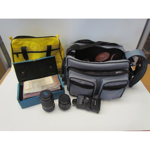 5072 - A camera bag containing a Carl Zeiss Jena F70-210mm lens, filter lenses and a emu-marine waterproof ... 